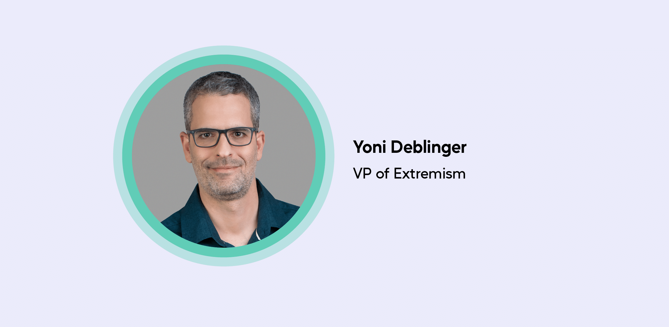 Profile picture of Yoni Deblinger, VP of Extremism at ActiveFence. Yoni is wearing glasses and a dark blue shirt, with a neutral background.