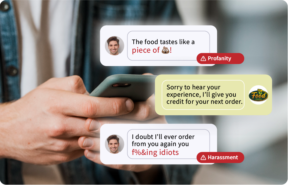 Person holding a phone with messages displayed showing profanity and harassment in food delivery service feedback, alongside a customer service response.